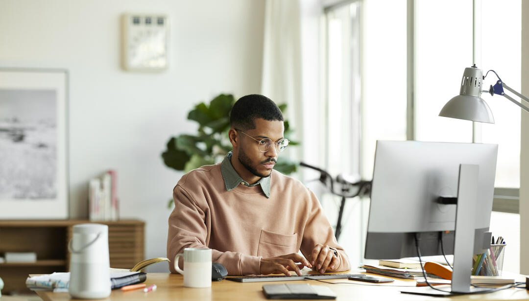 Man sitting at computer working