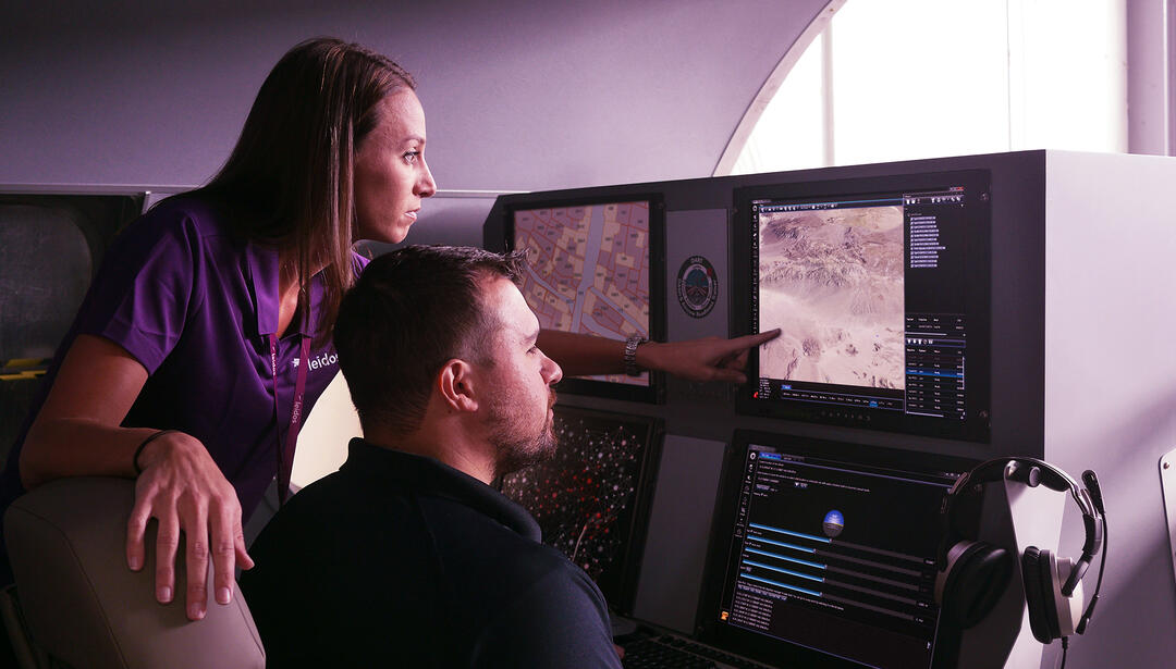 Co-worker looking at a monitor