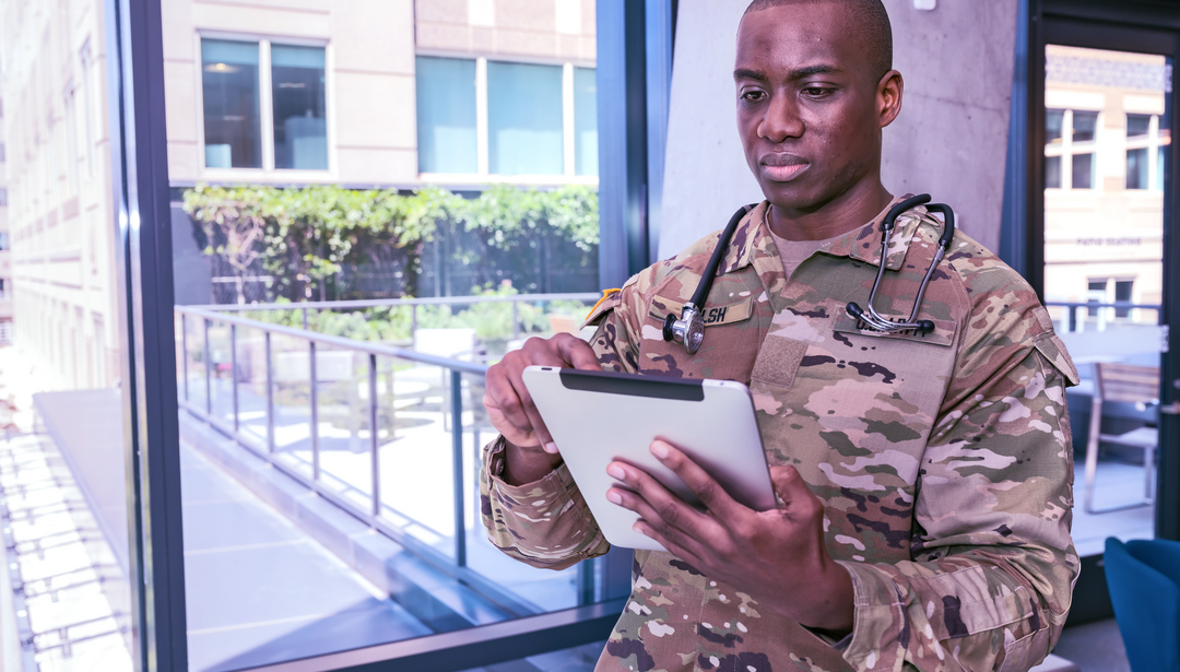 medic Soldier looking at tablet