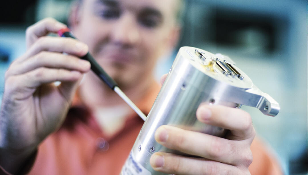 Worker with screwdriver