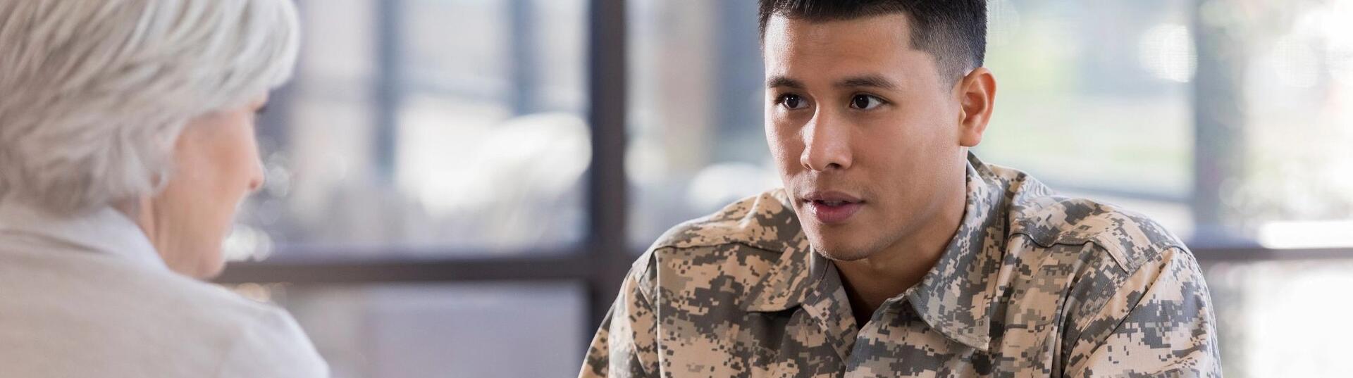 Service member speaking with a doctor