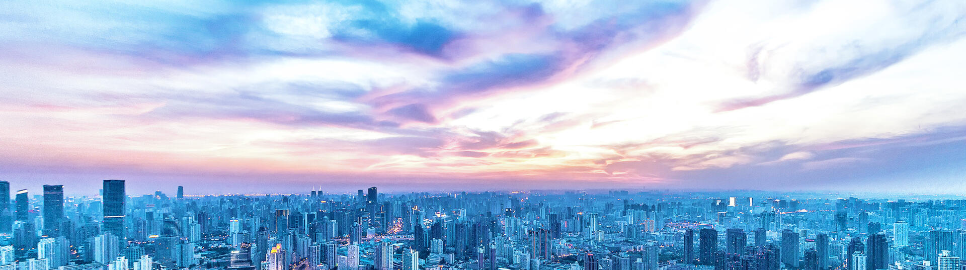 skyline of a city at sunset