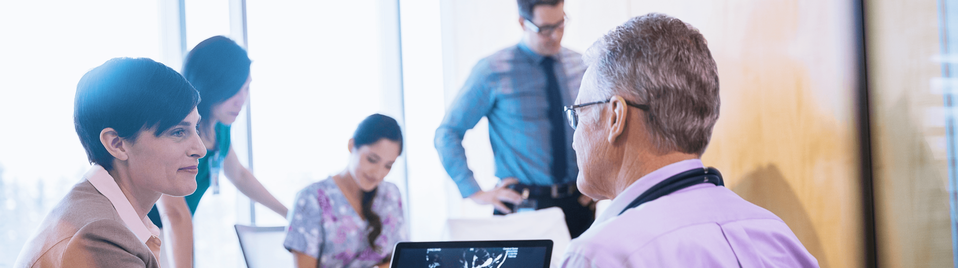 doctor and patient reviewing screen