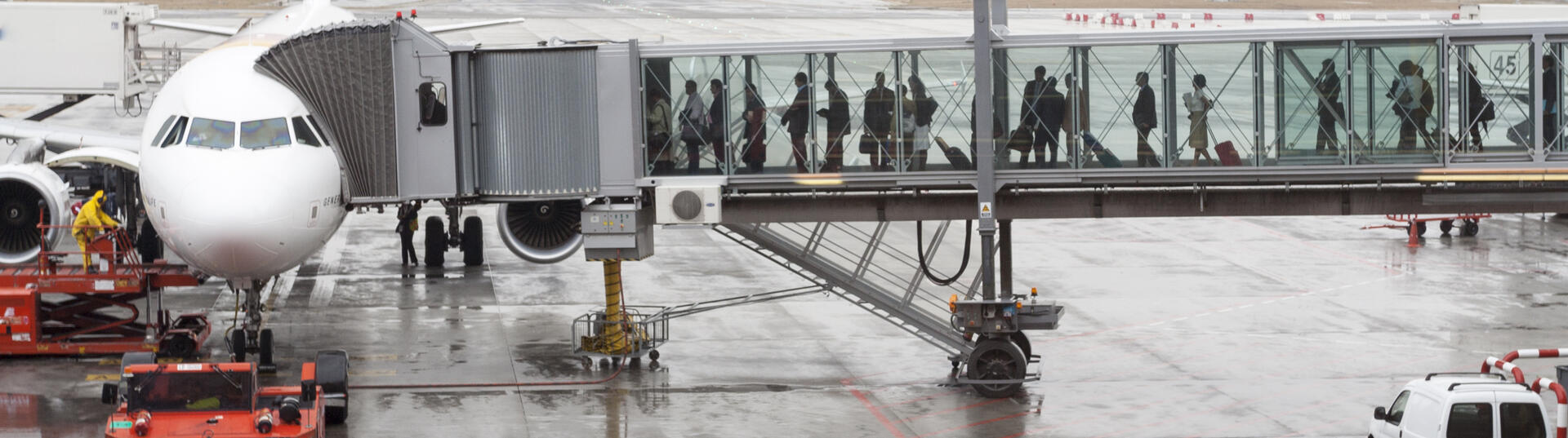 people boarding a plane