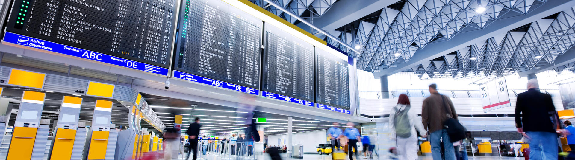 people walking through airport