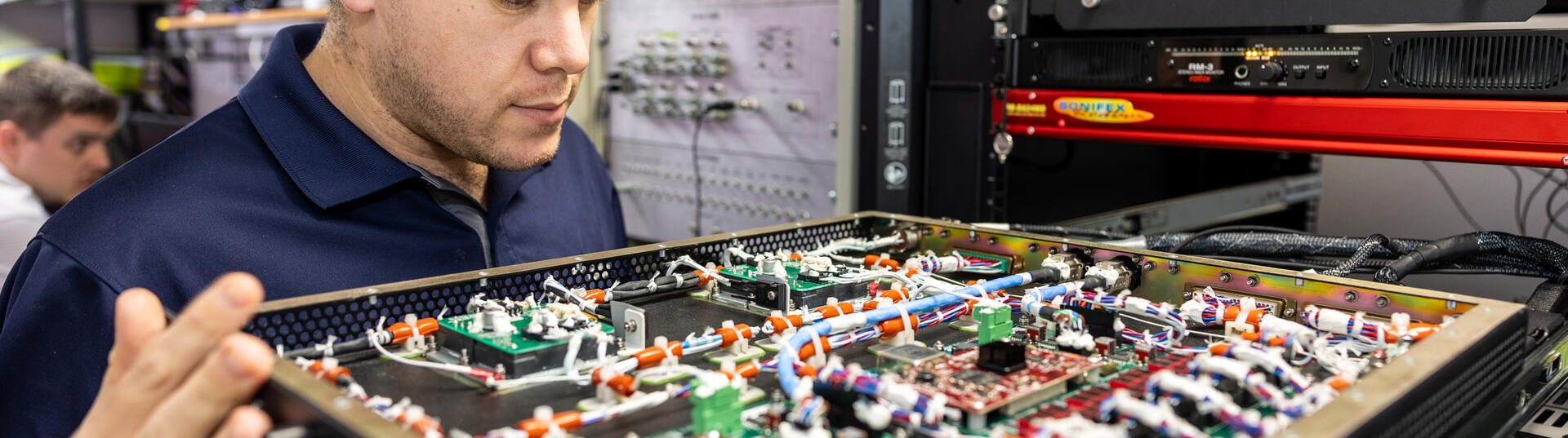 Engineer looking at some technical equipment