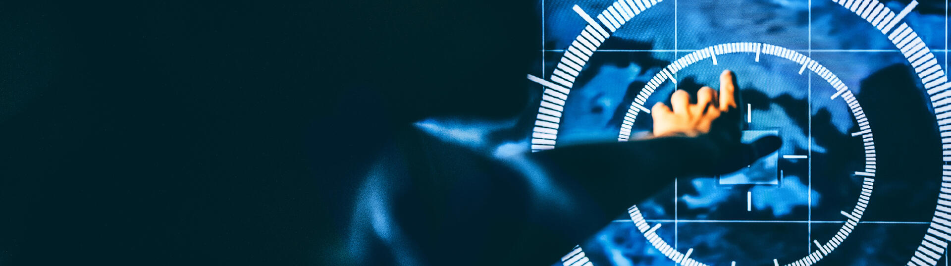 hand reaching to screen with target