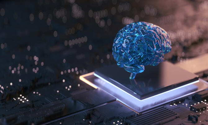 A translucent blue brain model sits atop a glowing computer chip on a circuit board, symbolizing artificial intelligence, machine learning and advanced computing technologies.