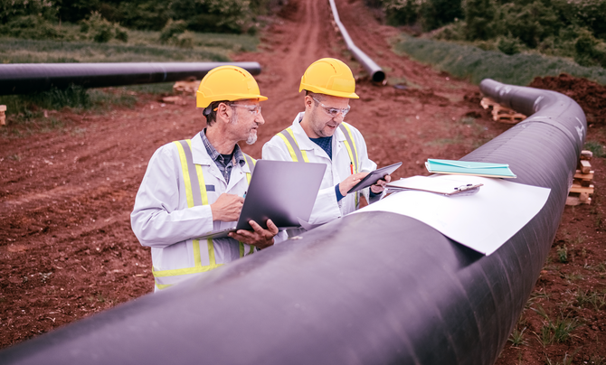 Oil and gas engineers performing construction management