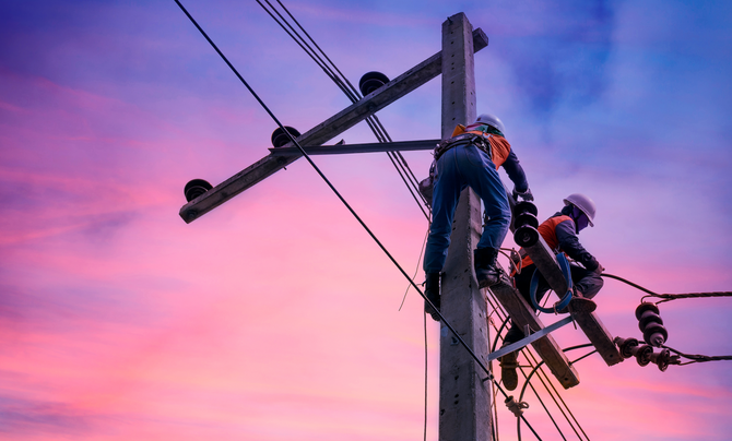Lineworkers on distribution lines