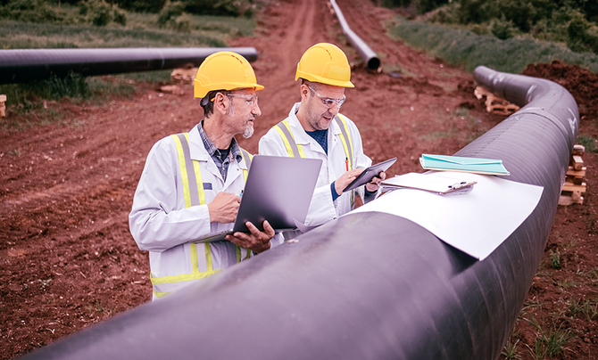 Oil and gas engineers performing construction management