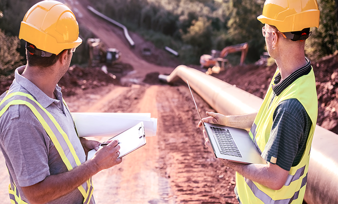 Engineers overseeing oil and gas asset integrity and compliance