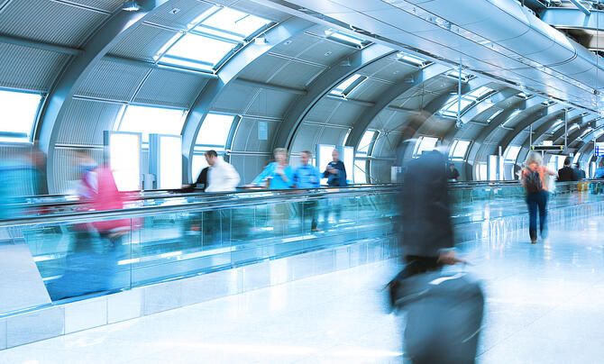 Passengers traveling through an airport