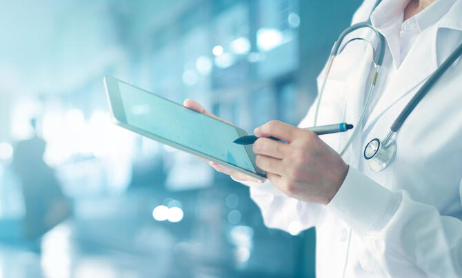 Healthcare professional with tablet