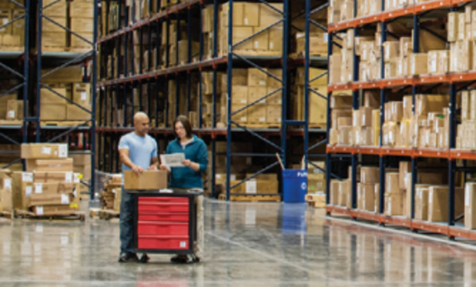 two employees in a warehouse