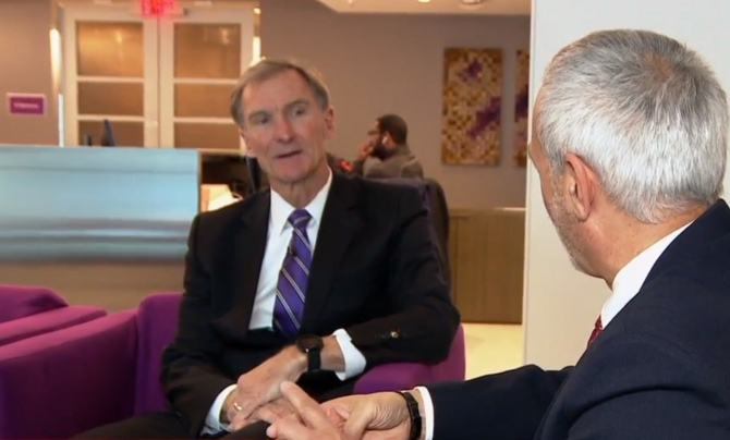 Roger Krone talking to John Hindman