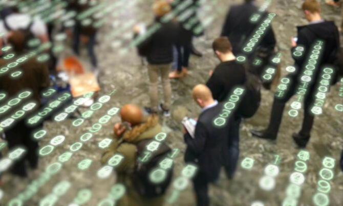 concept image shows crowd of people using their electronic devices and giving away their data unknowingly