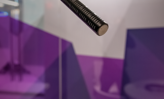 photo showing a microphone in a recording studio