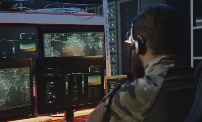 solder looking at monitors 