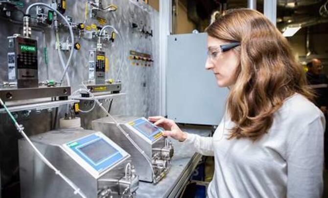 Candace Ellison with carbon capture machine