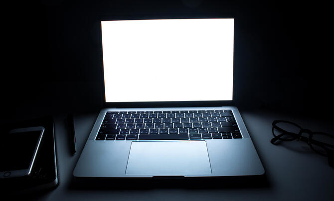laptop in a dark room