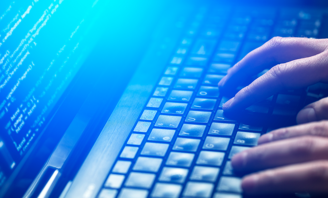 typing on laptop blue light