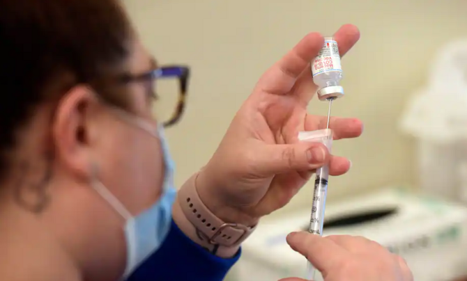 Nurse administering vaccine