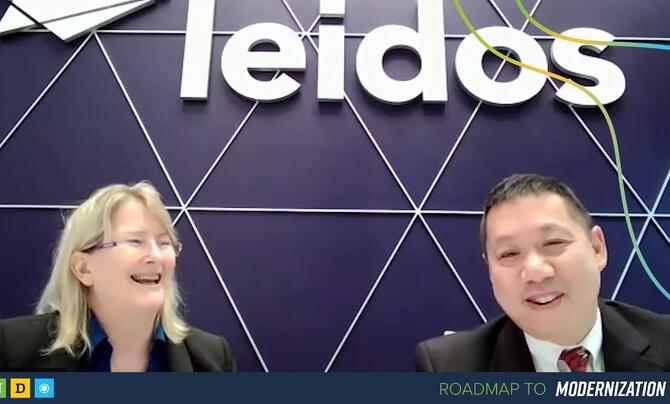 two presenters laughing in webinar