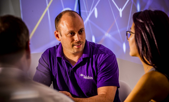 Leidos employees talking