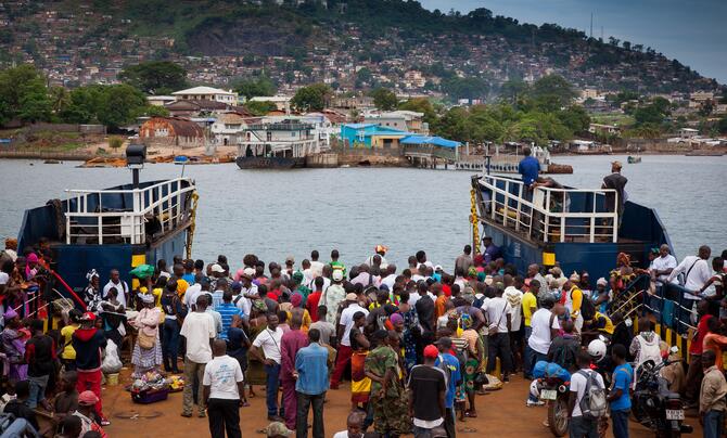 A ferry docking at the harbor of Freetown in Sierra Leone.