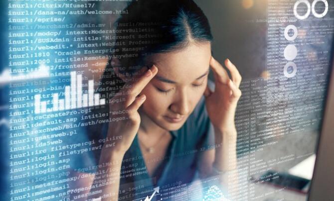 woman stressed looking at data