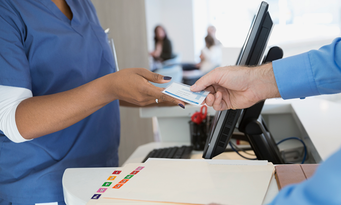 Nurse accepting medical card