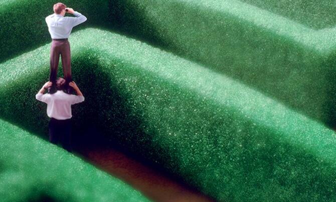 Person looking over maze