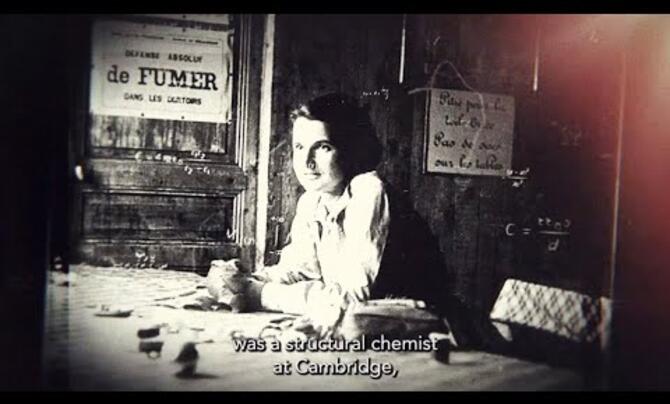 Rosalind Franklin at a desk
