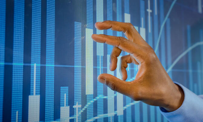 Person analyzing data on a screen