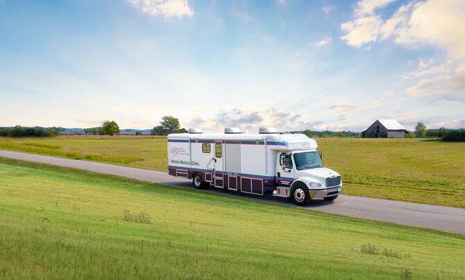 A QTC mobile medical clinic on the road in a rural part of the country