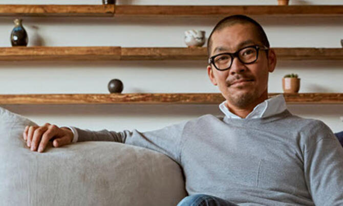 man sitting on couch