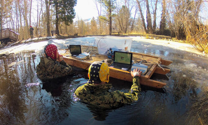 two neuroscientists performing research in the field