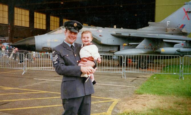 Mick with baby Connor working at RAF Waddington Airshow, 1998