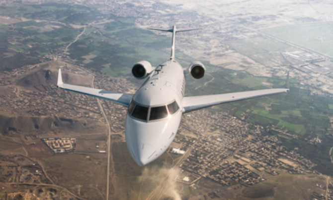 A plane flying through the air