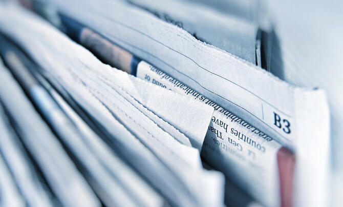 newspapers stacked