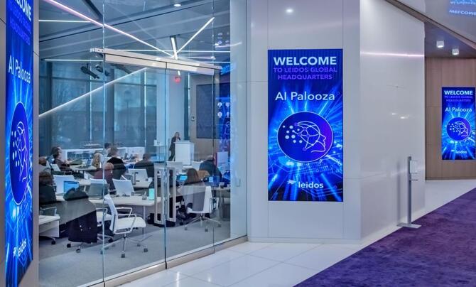 A meeting space at Leidos Global Headquarters with AI Palooza signage