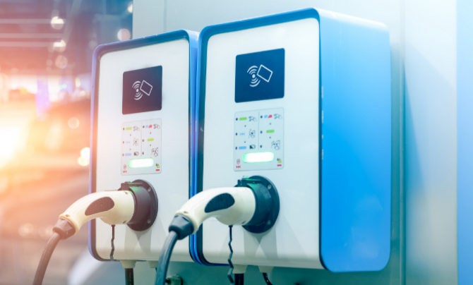 electric chargers plugged into a wall outlet