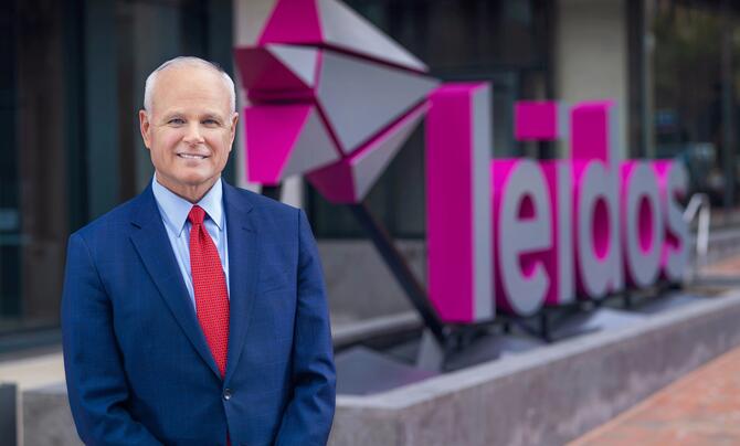Tom Bell in front of Leidos GHQ in Reston, Va.