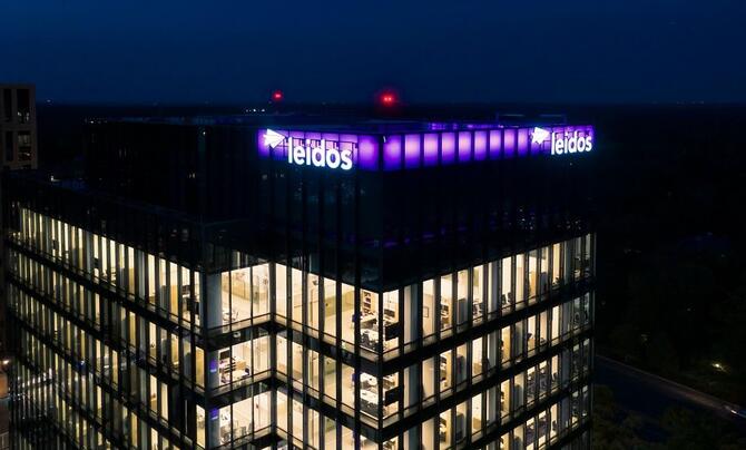 An aerial shot of the top floors of Leidos Global Headquarters ad dusk