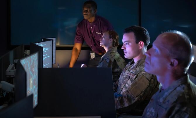 Generic military command center with embedded Leidos support team.