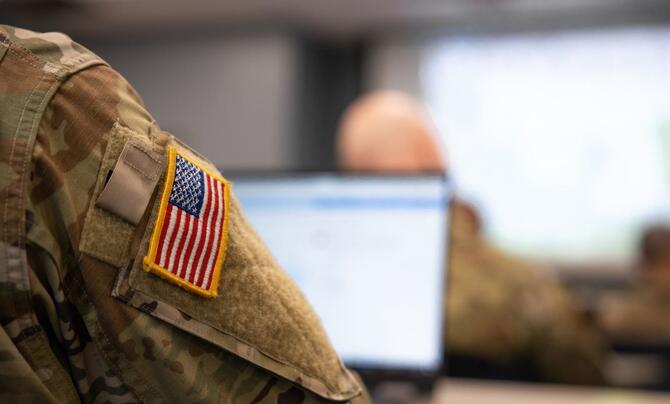 Army uniform with faded computer screen