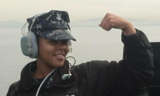 LaShonda Hill flexing a muscle