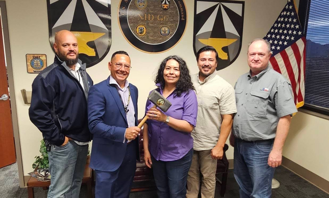 Jody Hidalgo receiving Forge Hammer award