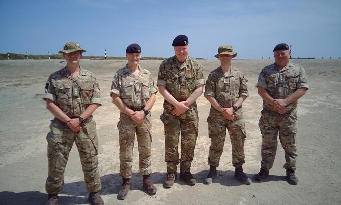 5 men in military uniforms
